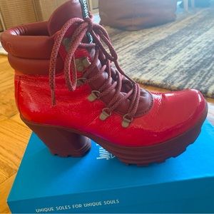Hot pink John Fluevog boots.